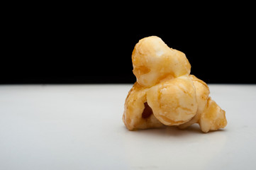 caramel popcorn on a white background