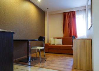 Couch and wooden table in modern room