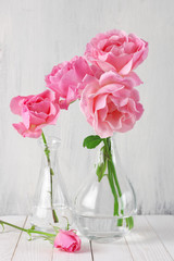 Pink roses in vases