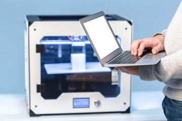 Designer Working With 3D Printer