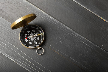 compass on the wooden table background