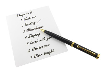 List with things to do and a pen