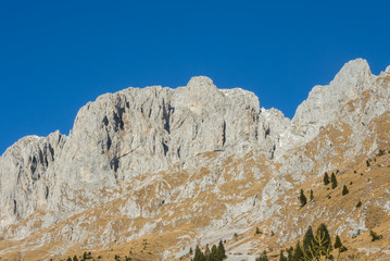Fototapeta na wymiar Presolana is a mountain range of the Bergamo Prealps. Orobie landscape in winter dry season without snow.