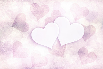 Grunge soft violet red pastel colored Valentine's Day background with two white copy space hearts illustration.