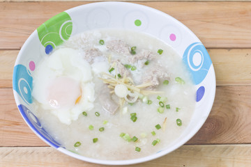 Traditional chinese porridge rice gruel in bowl.
