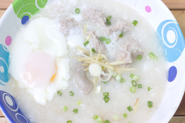 Traditional chinese porridge rice gruel in bowl.
