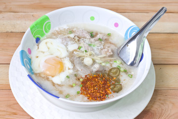 Traditional chinese porridge rice gruel in bowl.