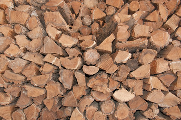 Pile of chopped fire wood prepared for winter