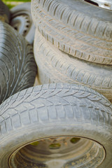 Tire stack background. Selective focus.