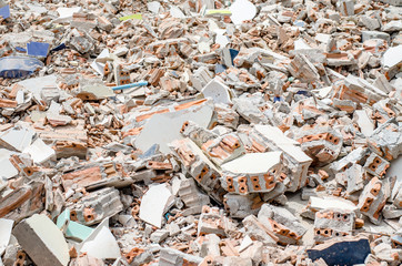 Concrete and brick rubble debris on construction site