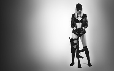sexy girl in black lingerie with assault rifle