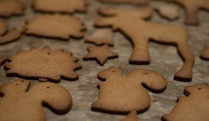 different shapes baked from gingerbread dough