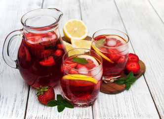 Glasses of lemonade with strawberries