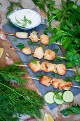 Skewers of chicken on wooden skewers