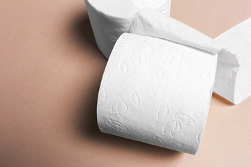 Toilet paper on pink background