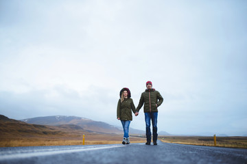 Couple Walking on Lonely Road