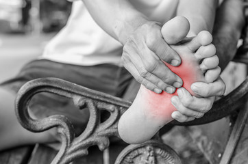 Pain in the foot. Massage of male feet. Pedicures.