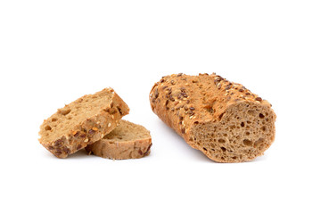 Sliced wholemeal baguette isolated on white background