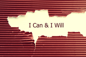 I Can And I Will message written under torn paper.