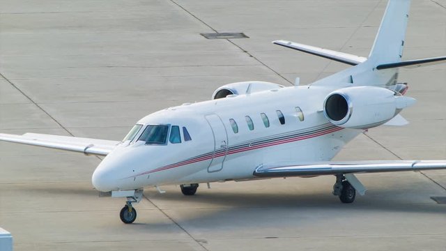 Corporate Jet Arriving at Executive Airport Terminal