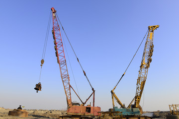 Crawler crane in the construction site