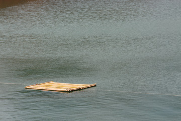 bamboo raft floating on water