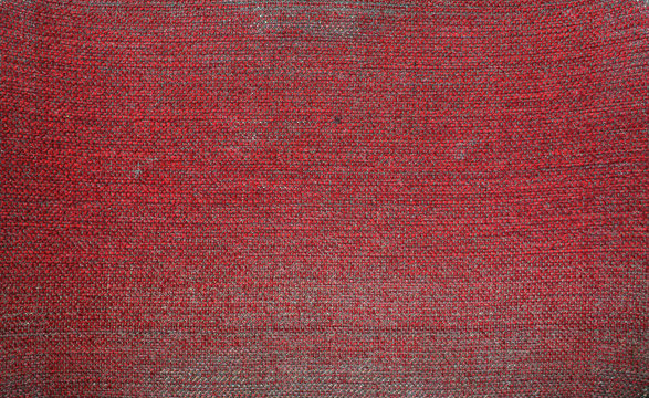 old red cloth slightly worn from natural material