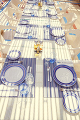 restaurant table setting, with bright colors and Mediterranean-s