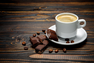 fresh cookies and coffee on wooden background