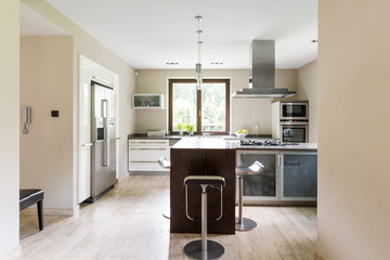 Bright open kitchen with refrigerator