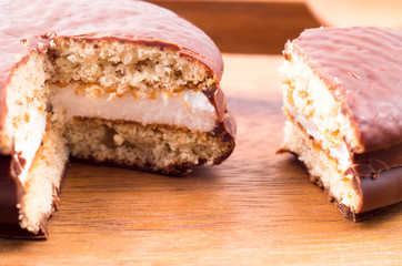 Macro view of the chocolate chip cookies with a layer of milk so