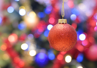 Fototapeta premium Red ball on lightning bulbs background