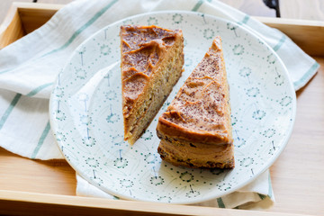 Two slices of cake on a plate
