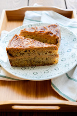 Two slices of cake on a plate