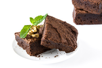 Chocolate brownie pieces isolated on white background
