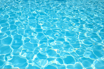 Beautiful blue water surface in swimming pool for background