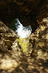 Close up of a uniquely shaped gap created in a rock formations