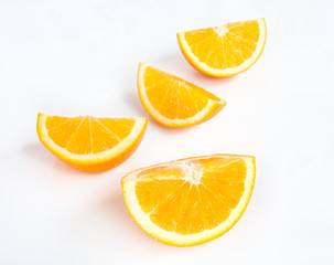 Orange slices over white.