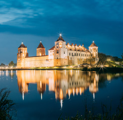 Fototapeta na wymiar Belarus. Scenic View Of Mir Castle Complex In Bright Evening Illumination