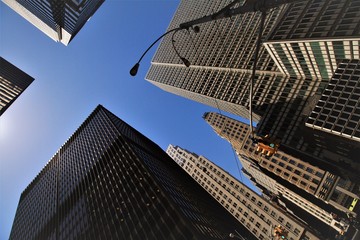 Fototapeta na wymiar New York City; Looking upwards in Downtown Manhattan