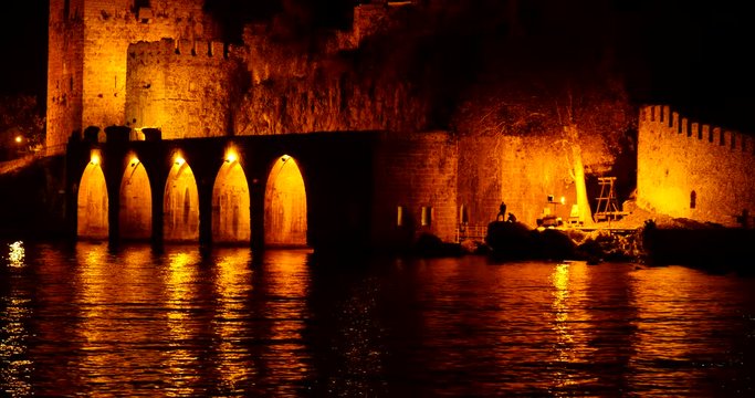 Ancient castle in night illumination