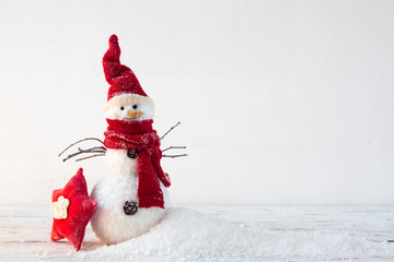 Hand made snowman on a white background