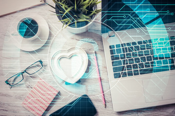 Business workplace with laptop coffee cup and security concept o