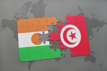 puzzle with the national flag of niger and tunisia on a world map