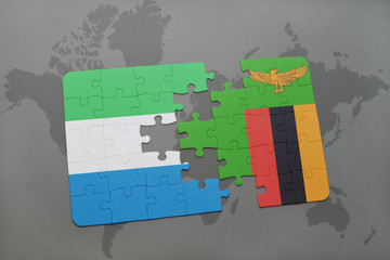 puzzle with the national flag of sierra leone and zambia on a world map
