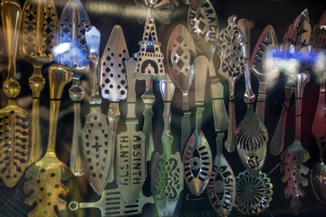 Absinthe spoons displayed in window shop in center of Prague - 131749094