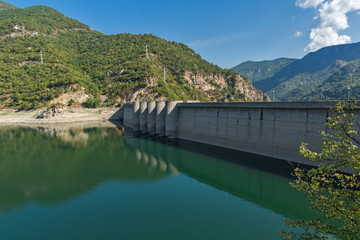 Fototapeta premium Landscape with Dam of the Vacha (Antonivanovtsy) Reservoir, Rhodopes Mountain, Bulgaria