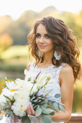Naklejka premium Beautiful young woman with long curly hair