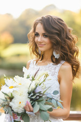 Naklejka premium Beautiful young woman with long curly hair