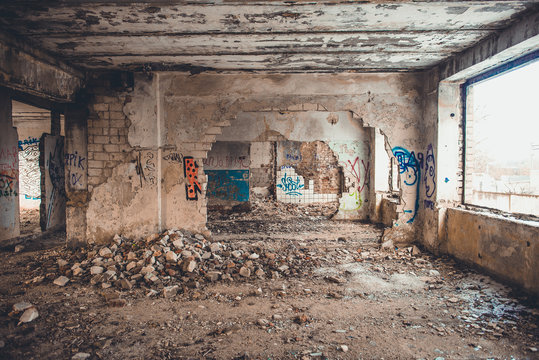 Empty destroyed room in an abandoned factory